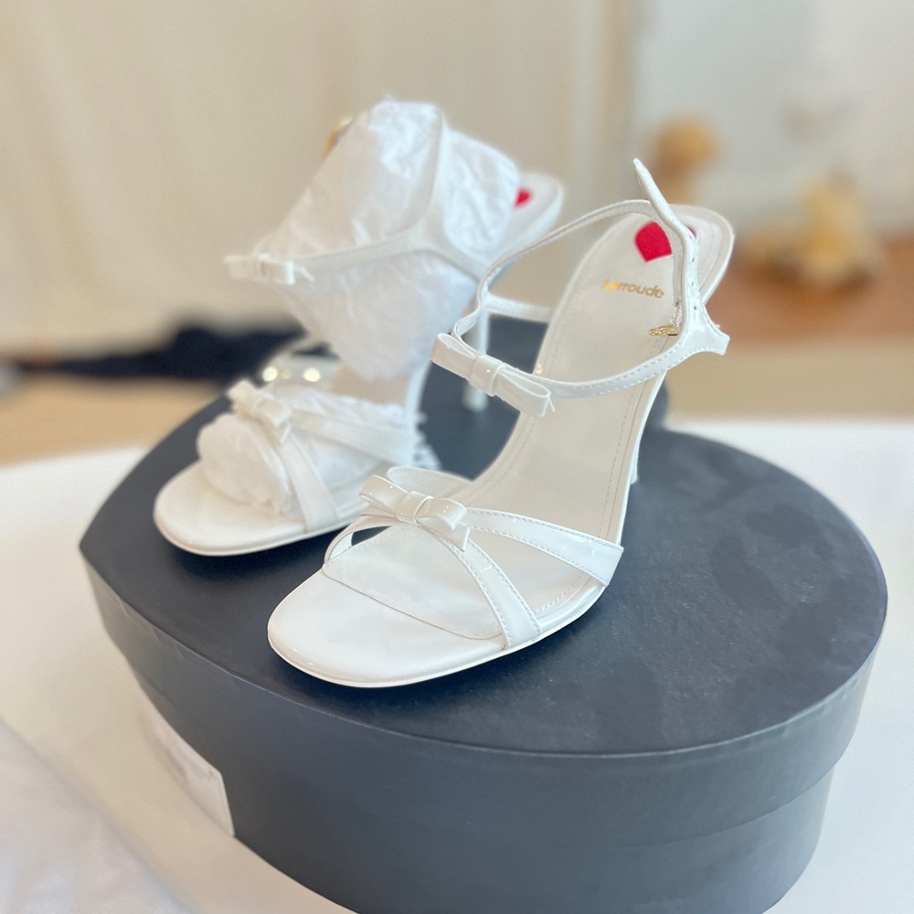 LARROUDÉ
Brooks Sandal In White Patent Leather